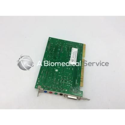 Green circuit board with gold edge connector and colored audio jacks of creative labs sound blaster awe64 ct4520 sound card