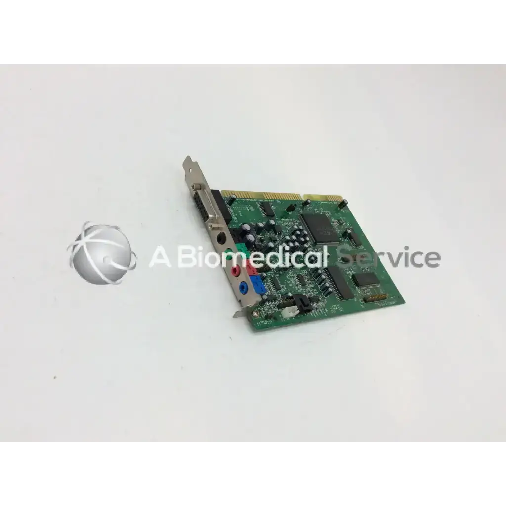 Green circuit board with black integrated circuits and colored audio jacks on creative labs sound blaster awe64 ct4520 pci sound card