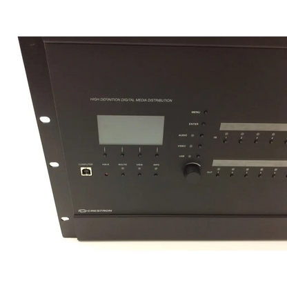 Black crestron dm-mdx8x8 high definition digital media distribution rack unit with screen buttons and ports