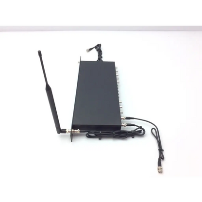 Black crestron cp2e professional media control processor with single antenna and multiple coaxial ports on back side