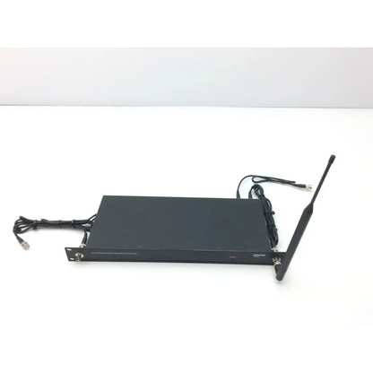 Black rectangular crestron cp2e professional media system control processor with antenna and multiple network cables connected