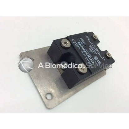 Black rectangular crydom d2425 solid-state relay 25a 240vac with silver screws and mounting plate branded clyde