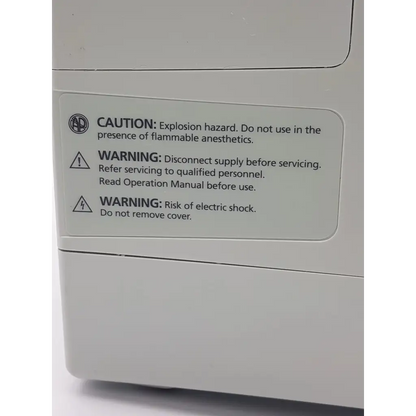White plastic medical device with safety warning labels for csi criticare 506n3 series comfort cuff patient monitor