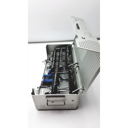 Stainless steel ctl total spin surgical instrument case total spin ref mks1031 with perforated sides and organized dental tools
