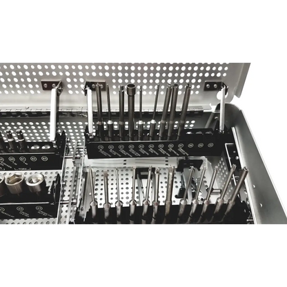 Organized surgical instrument tray with black and metallic tools in labeled compartments ctl total spin ref mks1031