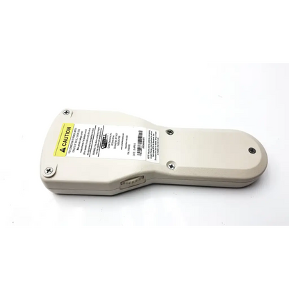 Beige plastic curbelle 31802-002 hospital pillow speaker with yellow caution and white info stickers visible
