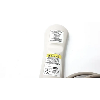 White plastic curbell 350200 g pillow speaker nurse call remote with gray cord and multiple warning labels