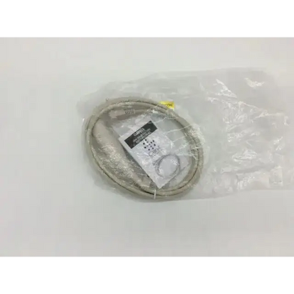 Gray coiled call cord with white label and yellow tag in clear packaging for curbell scc-0101-080-n gen4 sealed use