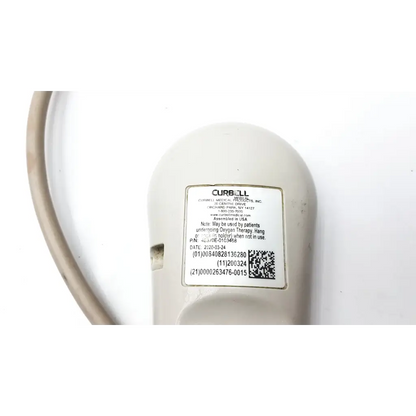 Off-white plastic curbell speaker nurse call remote showing label as a curbell medical product