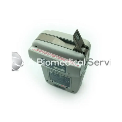 Gray curlin medical 2000 plus infusion pump with black latch and warning label for precise medical fluid delivery