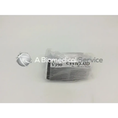 A sterile clear plastic-wrapped cysto-aid urine collection device v390 in original packaging for urine collection
