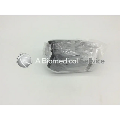Packaged cysto-aid urine collection device v390 in clear plastic wrap with gray and white label for urine collection