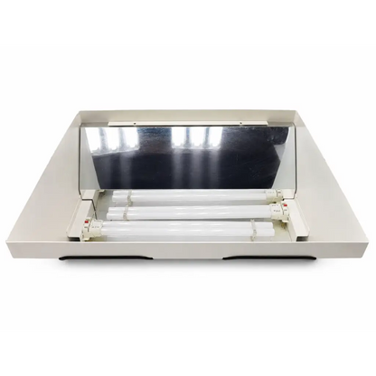 White rectangular Daavlin M Series biomed certified phototherapy unit with three horizontal fluorescent tubes and mirrored lid