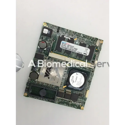 Green circuit board with black and silver components including memory module and cooling fan in dane elec sp133-064323jg pc133u-333-5412 board