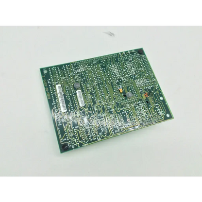 Green rectangular circuit board with gold-colored traces and components for Datascope 0670-00-0375 controller
