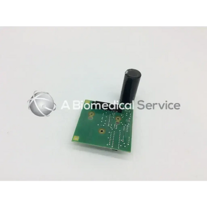 Green rectangular datex as3 compact rec buffer board mi 4f 883483-4 with black cylindrical component mounted on it
