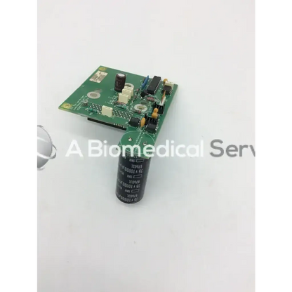 Green circuit board with electronic components and black capacitor on datex as3 compact rec-buffer board mi 4f 883483-4