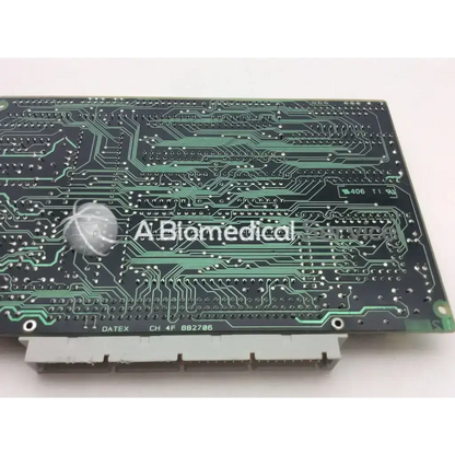 Black circuit board datex ch 4f bb2706 with green traces and silver solder points for mc74ac14n and board 74hc32ap use