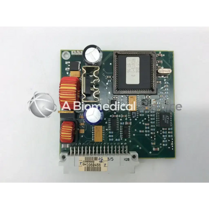 Green datex engstrom 94v-0 board with black integrated circuits, red coils, white capacitors, and gold connectors