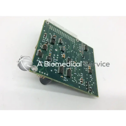 Datex engstrom 94v-0 board green circuit board with black integrated circuits and white spherical connector on corner
