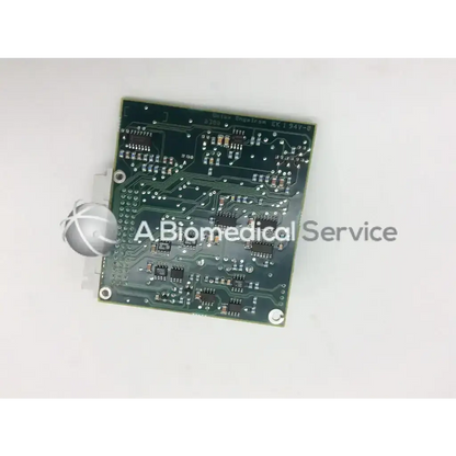 Green rectangular datex engstrom 94v-0 board with silver traces and electronic components mounted on its surface