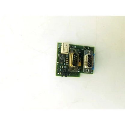 Green circuit board with two metallic db9 connectors and white component for datex- engstrom mc 4f 891512-3 bbcb3-10a