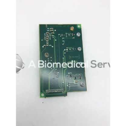 Green rectangular datex engstrom circuit board with silver soldered components and printed circuit traces