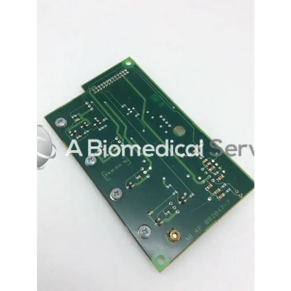 Green rectangular printed circuit board with silver screws and gold-plated connector datex engstrom mi 4f 882847-7 board