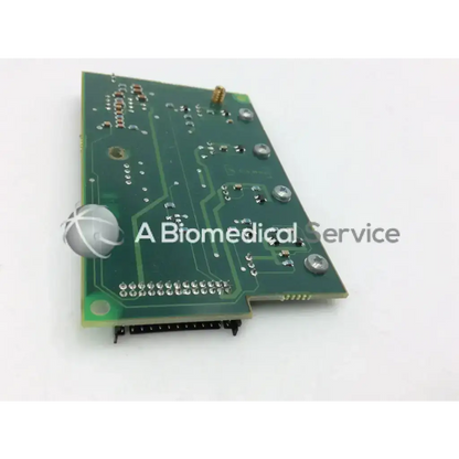 Datex engstrom mi 4f 882847-7 board showing green circuit board with silver screws gold connectors and black ribbon cable connector