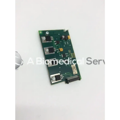 Green rectangular circuit board with black and silver components for datex engstrom MI 4F 882847-7 board