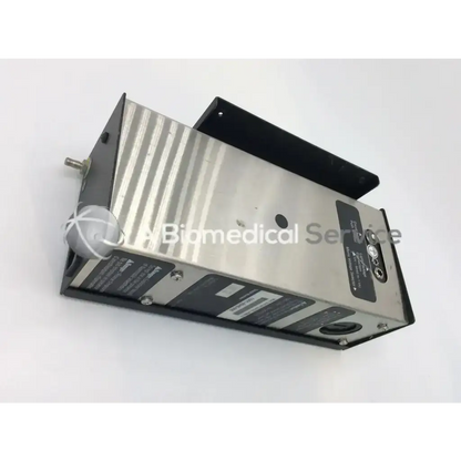 Silver metallic datex ohmeda excel electrical outlet box with black accents and ribbed surface for medical use