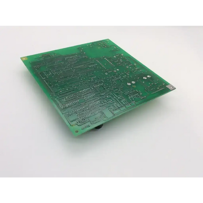 Green rectangular printed circuit board with silver traces and pads datex ohmeda 6600-0204-701 artwk rev pcb board