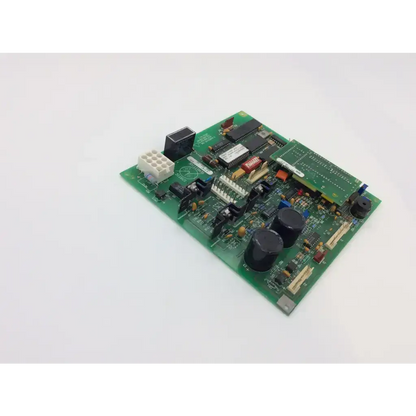 Datex ohmeda artwk rev 2 pcb board green circuit board with black capacitors integrated circuits and connectors