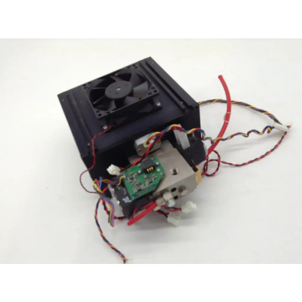 Black rectangular Datex-Ohmeda adu s5 anesthesia machine part with fan and exposed circuit boards and wires