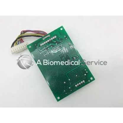 Green rectangular circuit board with silver soldered components and multi-colored wire harness for es24t15 anesthesia monitor parts es24t15 250xc