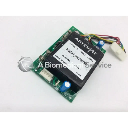 Black artesyn es24t15 250xc control module on green circuit board with capacitors and wiring for anesthesia monitor parts