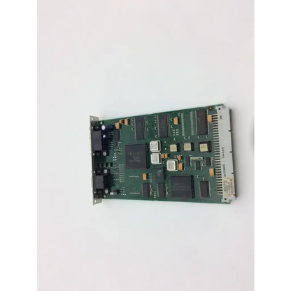 Green circuit board with black integrated circuits and gold connectors of datex-ohmeda b-disp-01 video display board