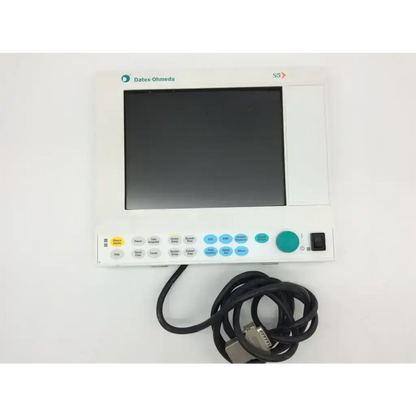 White datex-ohmeda s6 patient monitor with black screen blue and yellow buttons and coiled cable flat panel lcd d-lcc10w