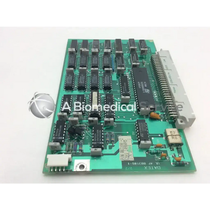 Green circuit board Datex UL 4F 883106-1 with black integrated circuits and silver connectors featuring board m74hcu04bi