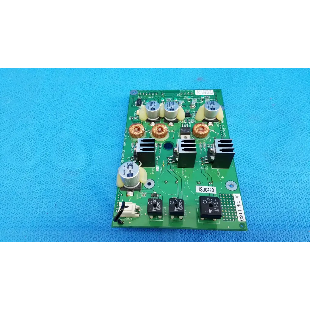 Green main power circuit board with capacitors inductors and heat sinks for topcon trc-nw6sf retinal camera