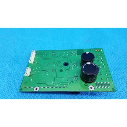 Green rectangular main power circuit board with black capacitors and white connectors for topcon retinal camera