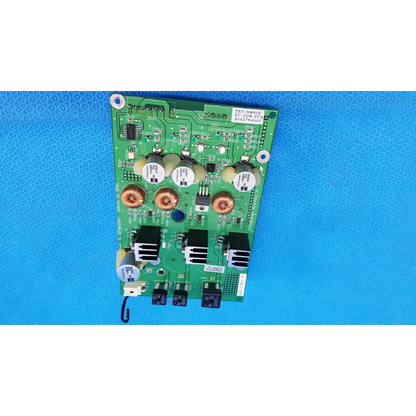 Green main power circuit board with copper coils white capacitors and black heat sinks for Topcon retinal camera
