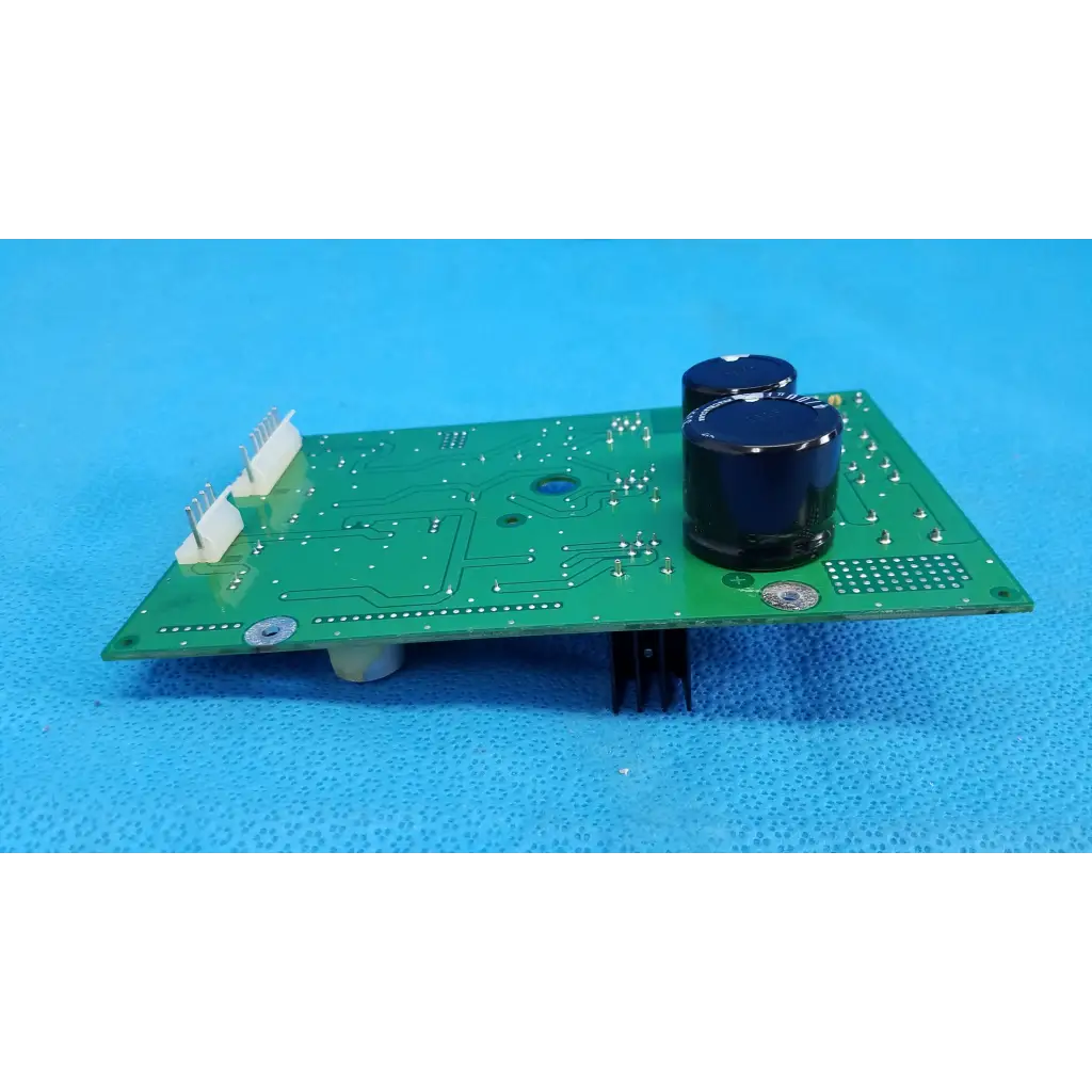 Green main power circuit board with black capacitors and white connectors for topcon trc-nw6sf retinal camera