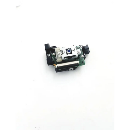 Black and silver laser pickup module with blue lens mounted on green circuit board of de470id8h 00e j49 board