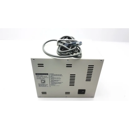 Back view of delasco model ev smoke evacuator 09ev065 silver metal with coiled gray power cord and ventilation slots