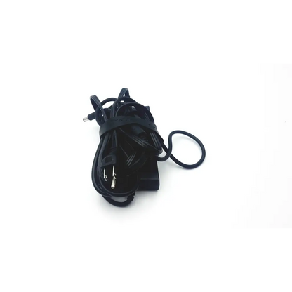 Black coiled dell da130pe1-00 acdc adapter laptop power charger with rectangular plug and thin cable wrapped around it