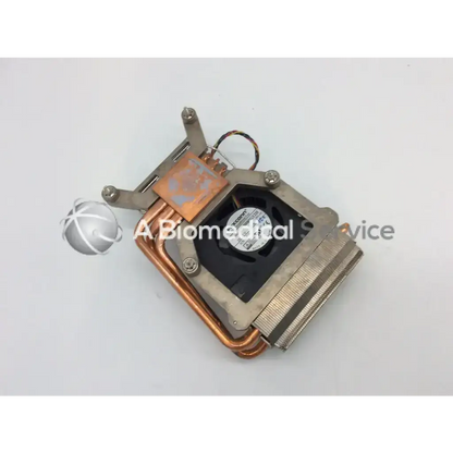 Dell Optiplex 0vxd9p 04x9h2 cpu cooling fan with heatsink in silver and copper colors and a black fan