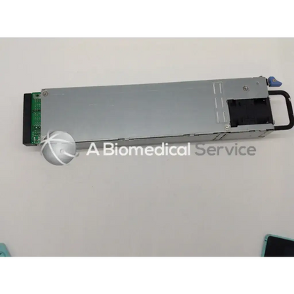 Silver metallic dell poweredge power supply 550w with black handle and green circuit board on one end
