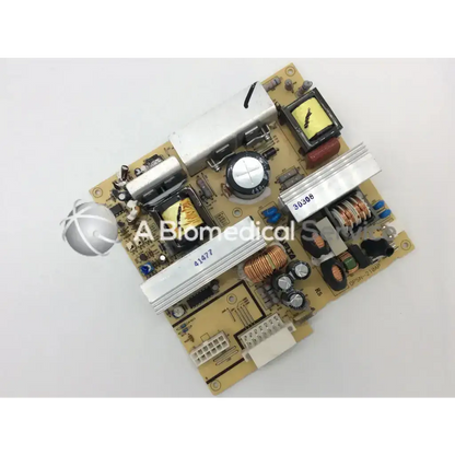 Gold-colored delta electronics dpsn-210ap circuit board with silver capacitors and white heat sink for bbce2-9 psu