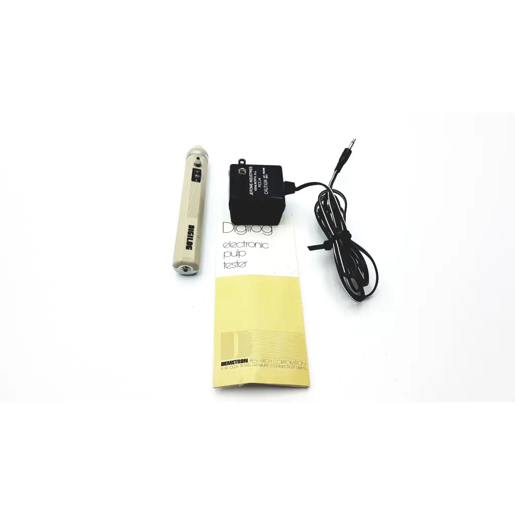 Beige demetron digilog electronic pulp tester with black charging adapter and coiled cable for dental use